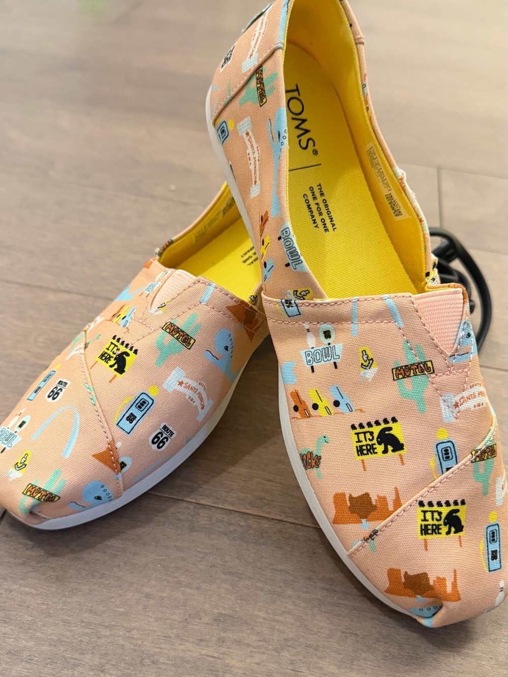 TOMS Peach Canvas Slip-Ons with Yellow Insole and Multicolor Prints